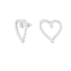 Heart-shaped silver earrings on a white background