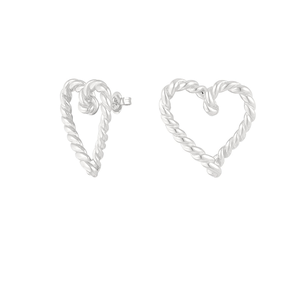 Heart-shaped silver earrings on a white background