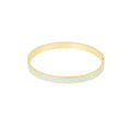 Gold bracelet with blue pattern on a white background bangle bynooni bynooninl