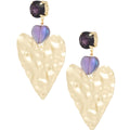 Heart-shaped earrings with purple gemstones on a white background