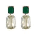 Pair of earrings with green topaz and clear rectangular stones on a white background