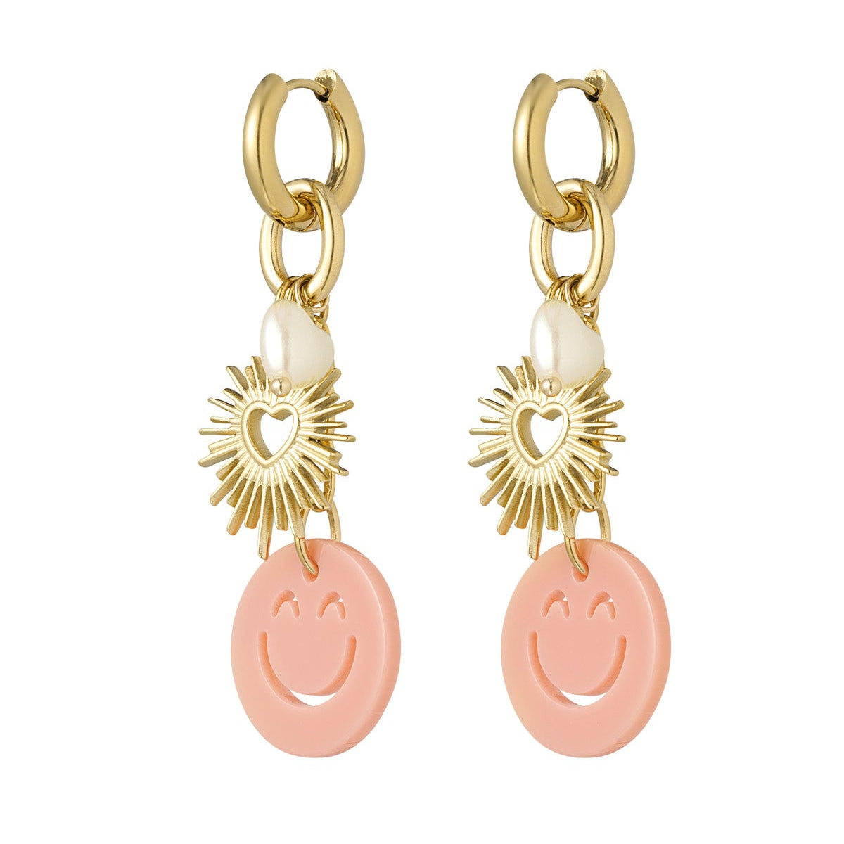 Pair of earrings with gold sun-shaped charms and pink smiley face pendants on a white background