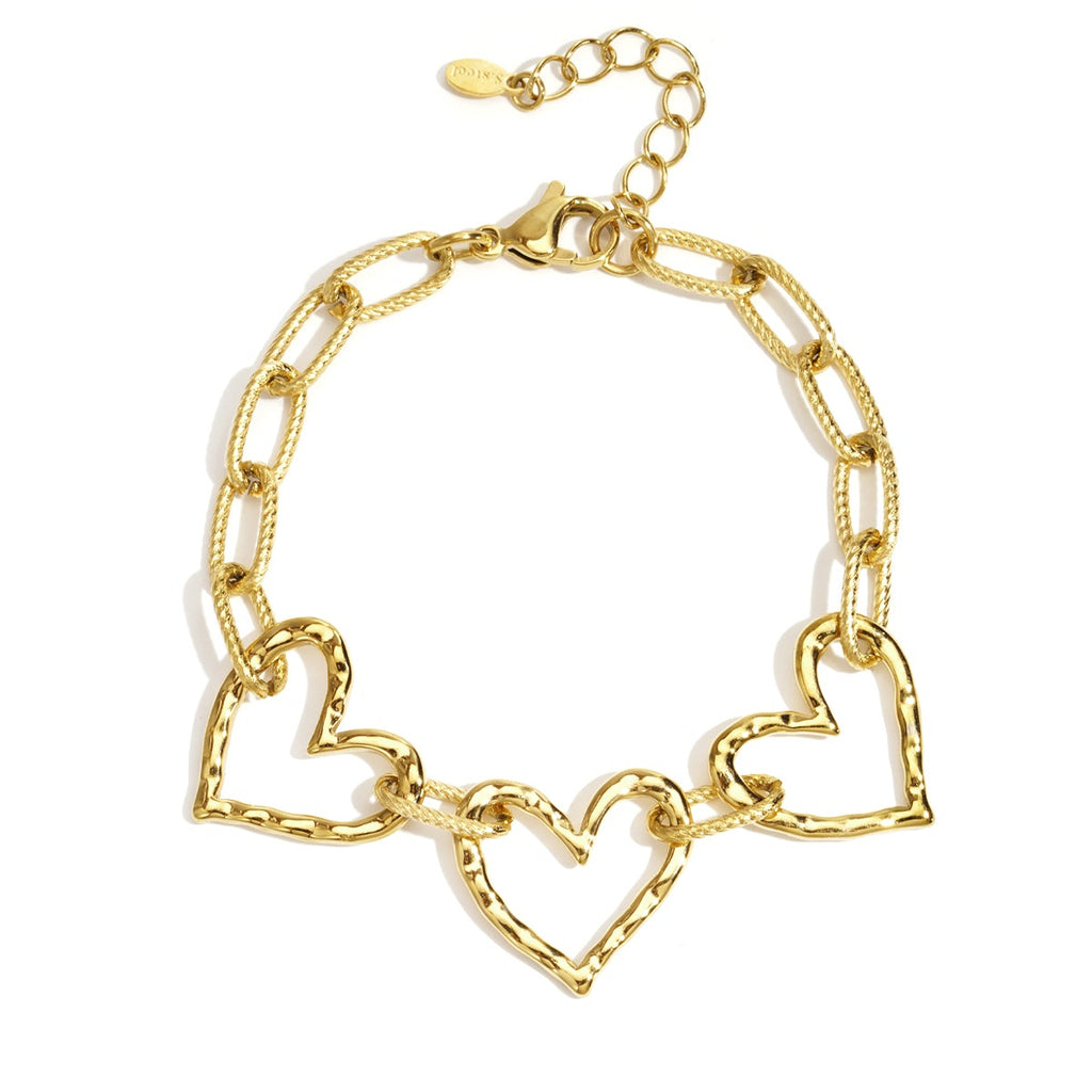 Gold chain bracelet with heart-shaped links on a white background