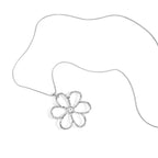 Silver flower-shaped pendant on a white background
