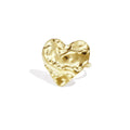Gold heart-shaped earring on a white background